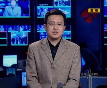 視頻連線江蘇省農民工工作辦公室副主任曹炳泰