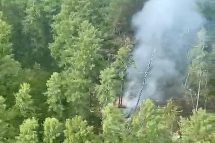 俄羅斯一架飛機失事 墜機現場升起煙霧